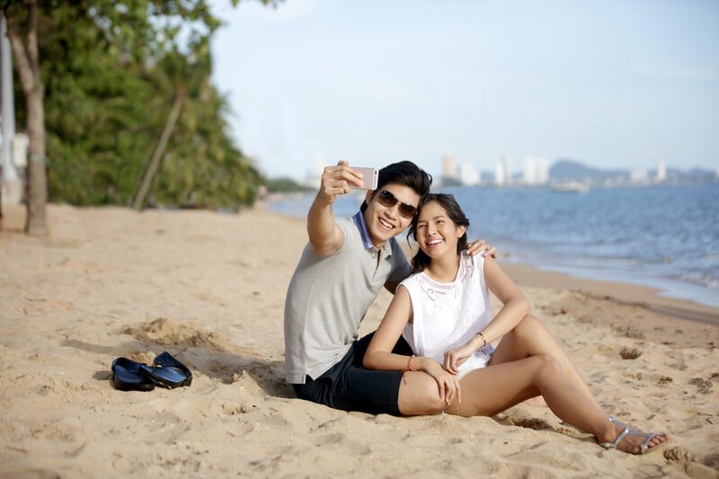  Instagram worthy places Singapore – couple taking photos at the beach